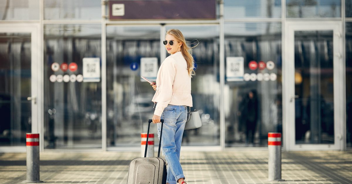 beautiful girl standing in a airport