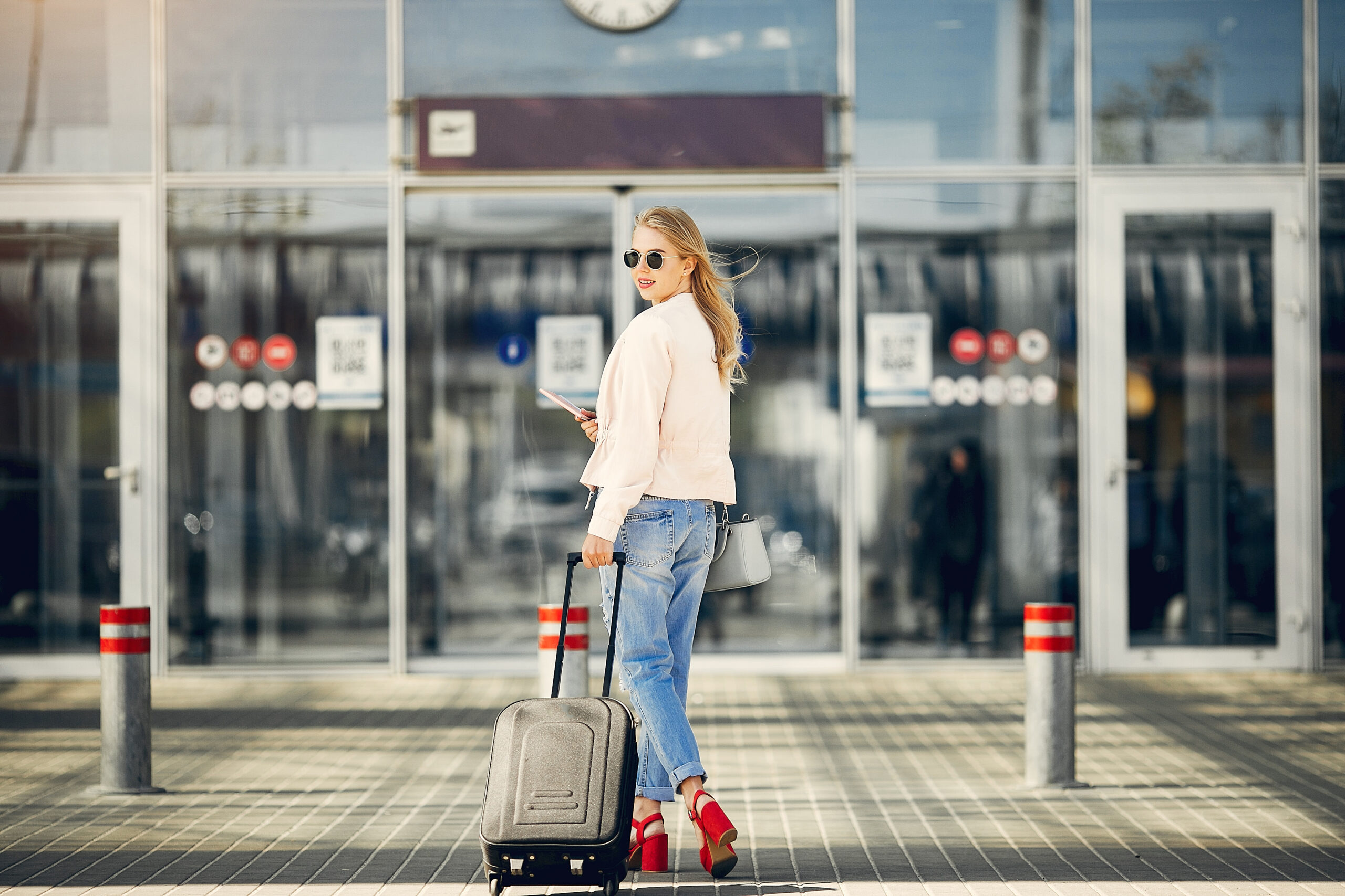 beautiful girl standing in a airport beautiful girl standing in a airport